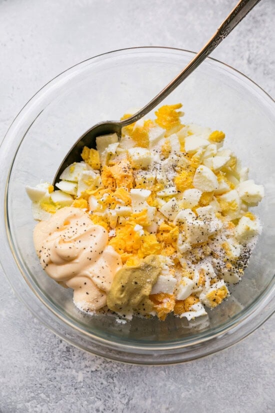 Add to a bowl with mayo, Dijon, salt pepper and pickle juice.