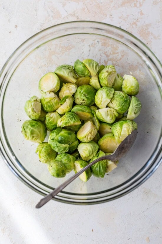 toss Brussel Sprouts with olive oil, salt and pepper.
