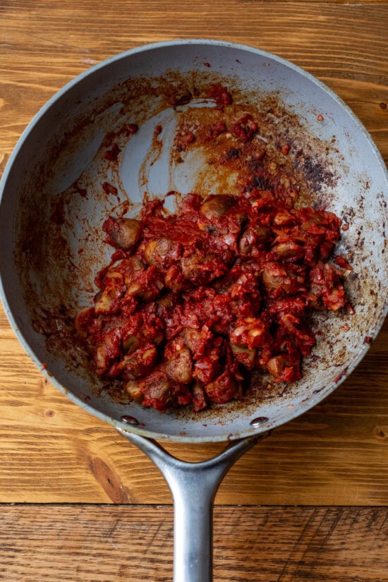 Add mushrooms, shallots, garlic and tomato paste.