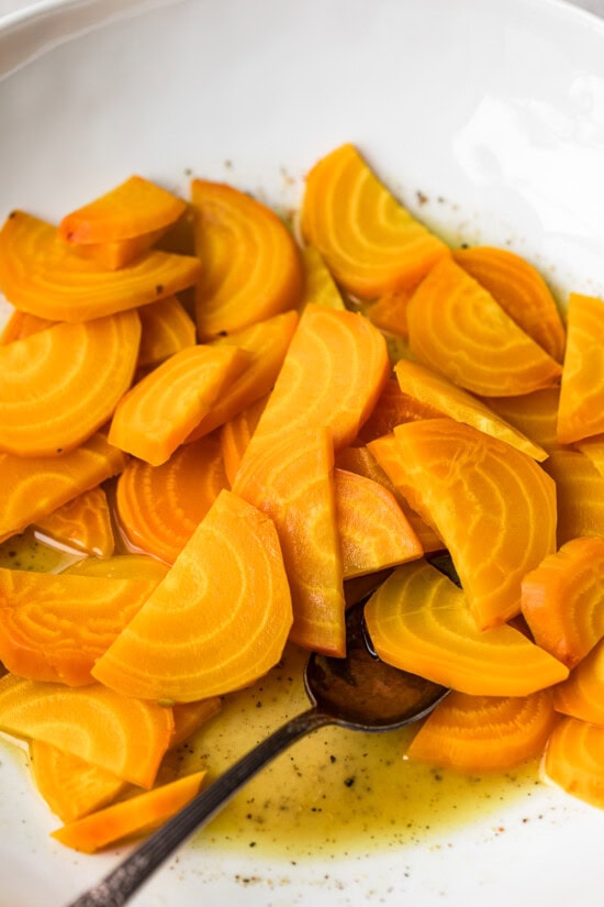 Toss the beets with the dressing.