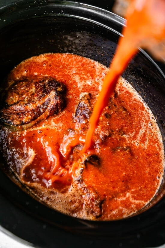 Pour sauce into slow cooker with remaining ingredients