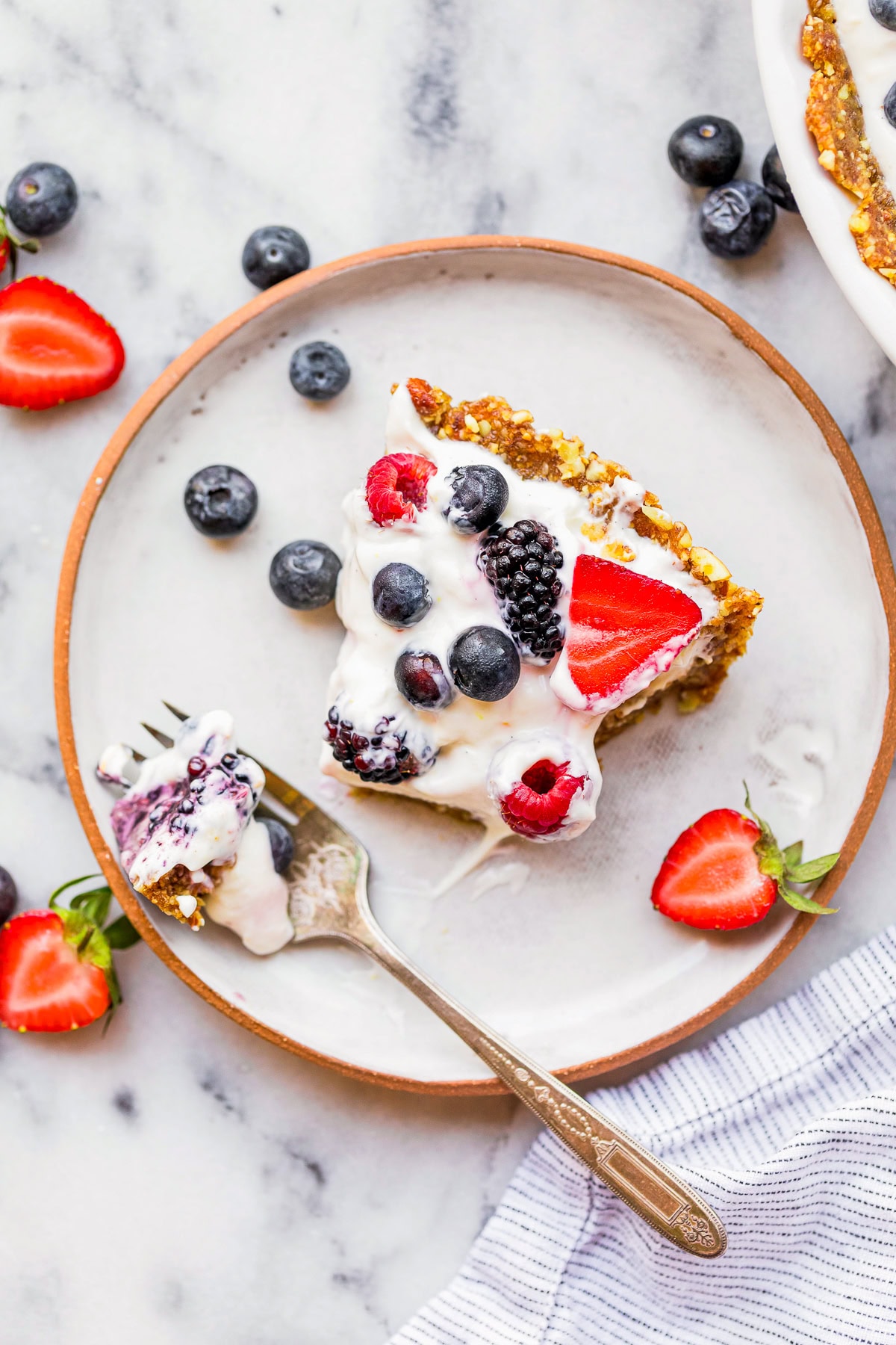 a slice of yogurt pie with date nut crust