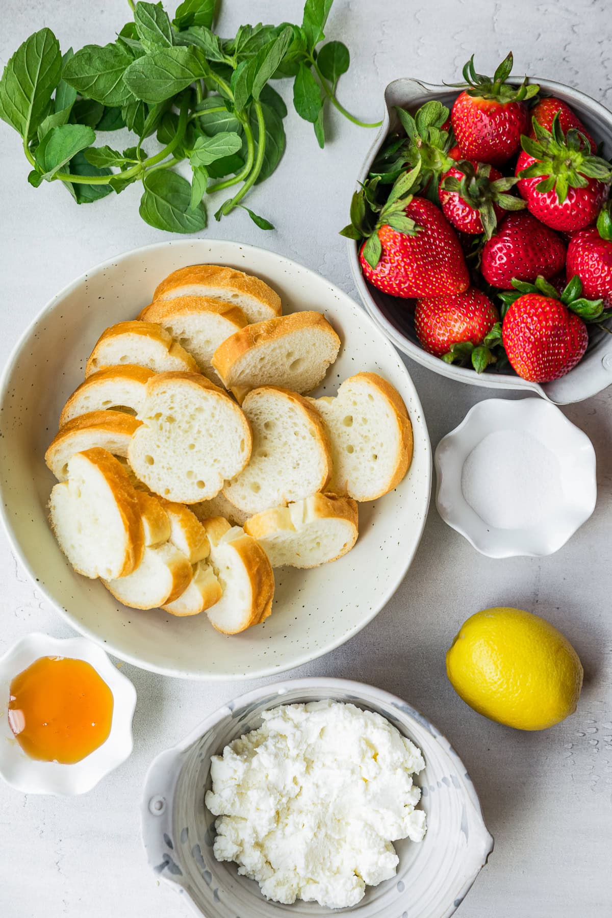 strawberries, toast, lemon, honey