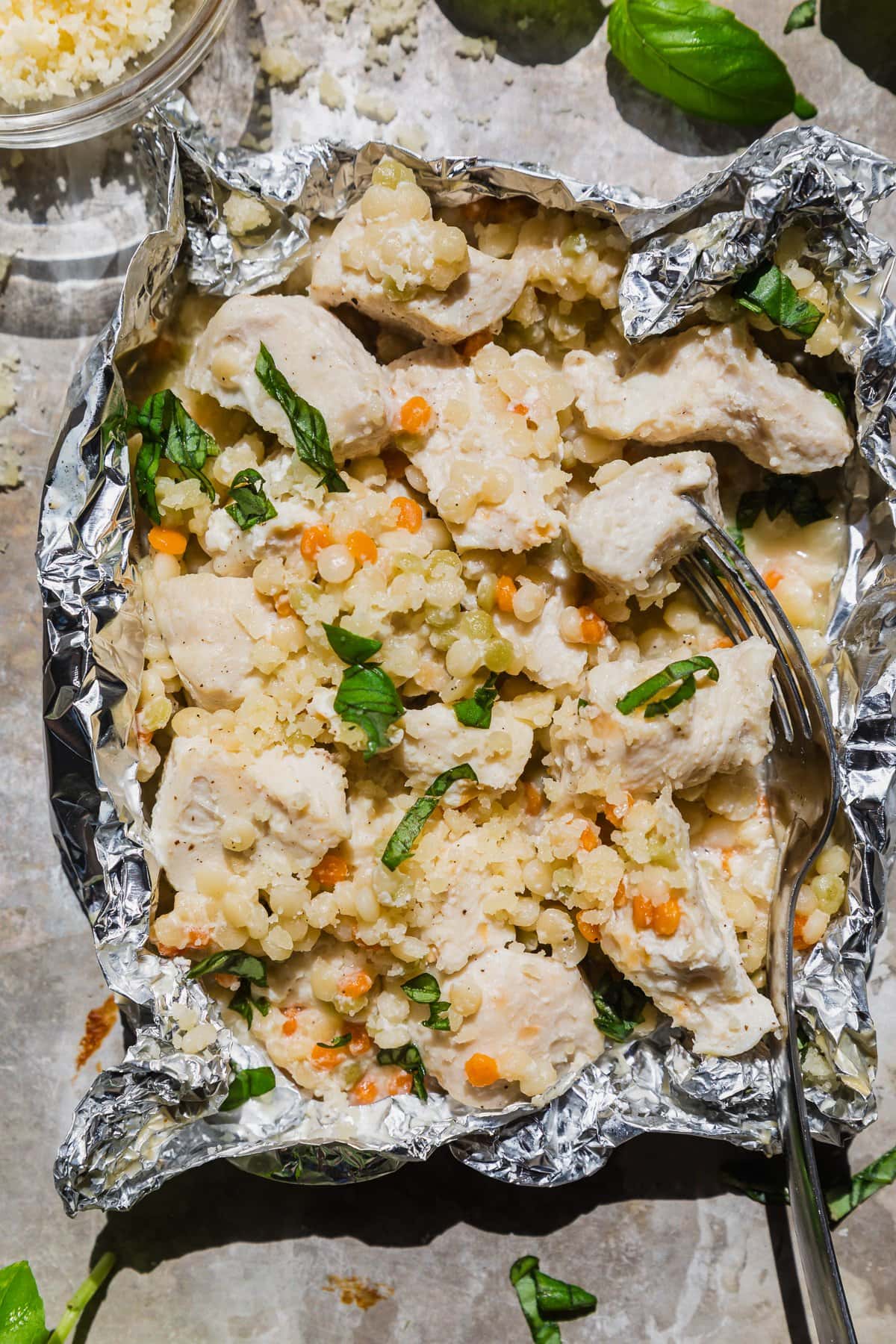 Garlic Parmesan Chicken Foil Packets with Couscous in foil
