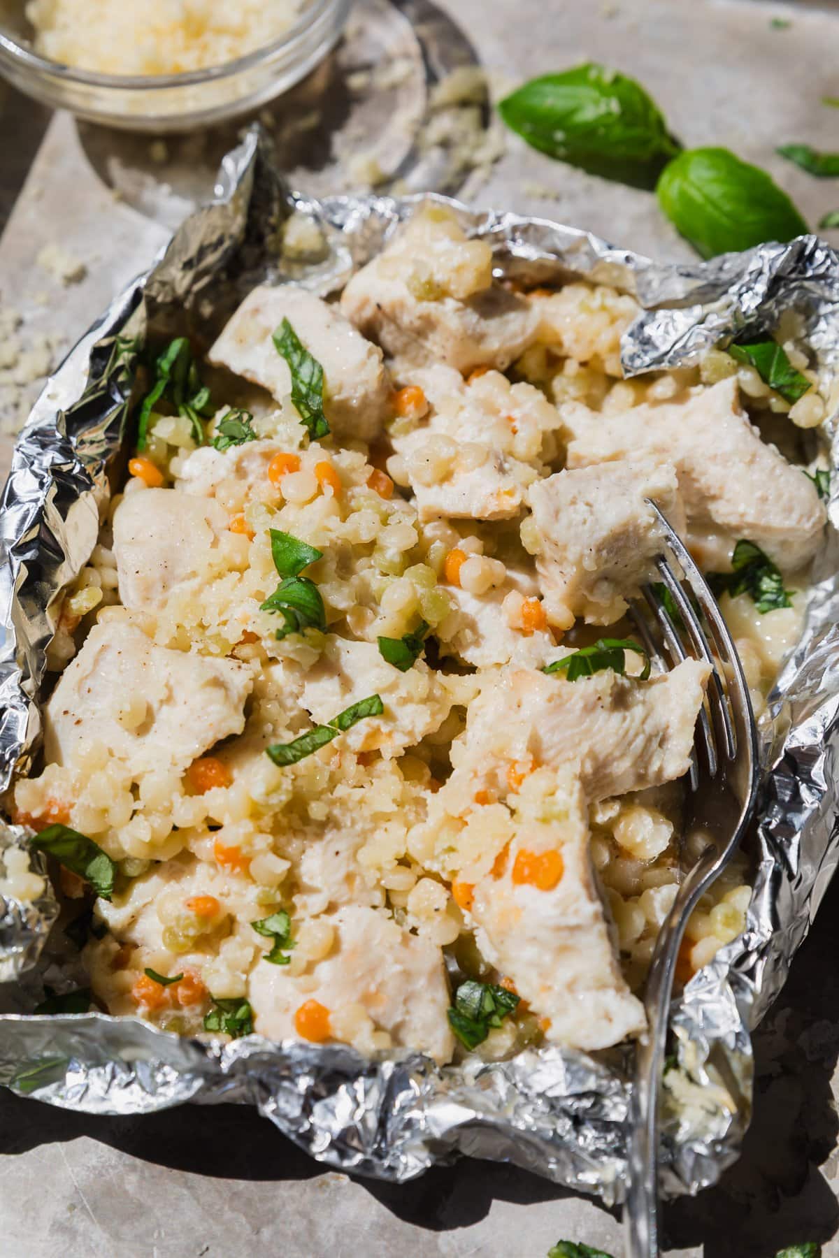 Garlic Parmesan Chicken Foil Packets with Couscous in foil