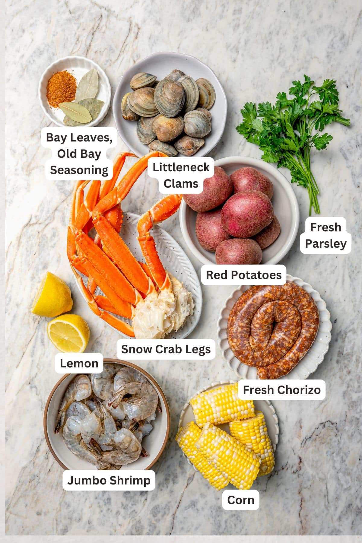 Overhead view of ingredients for one pot seafood boil