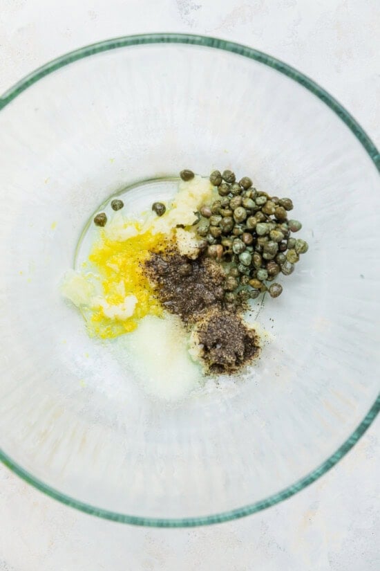 capers, lemon juice, lemon zest in a bowl
