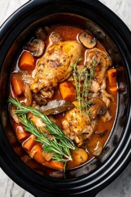 Healthy coq au vin in slow cooker.